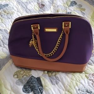 Purple leather bag.